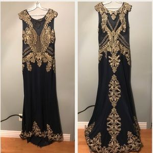Royal blue gown with gold embellishments